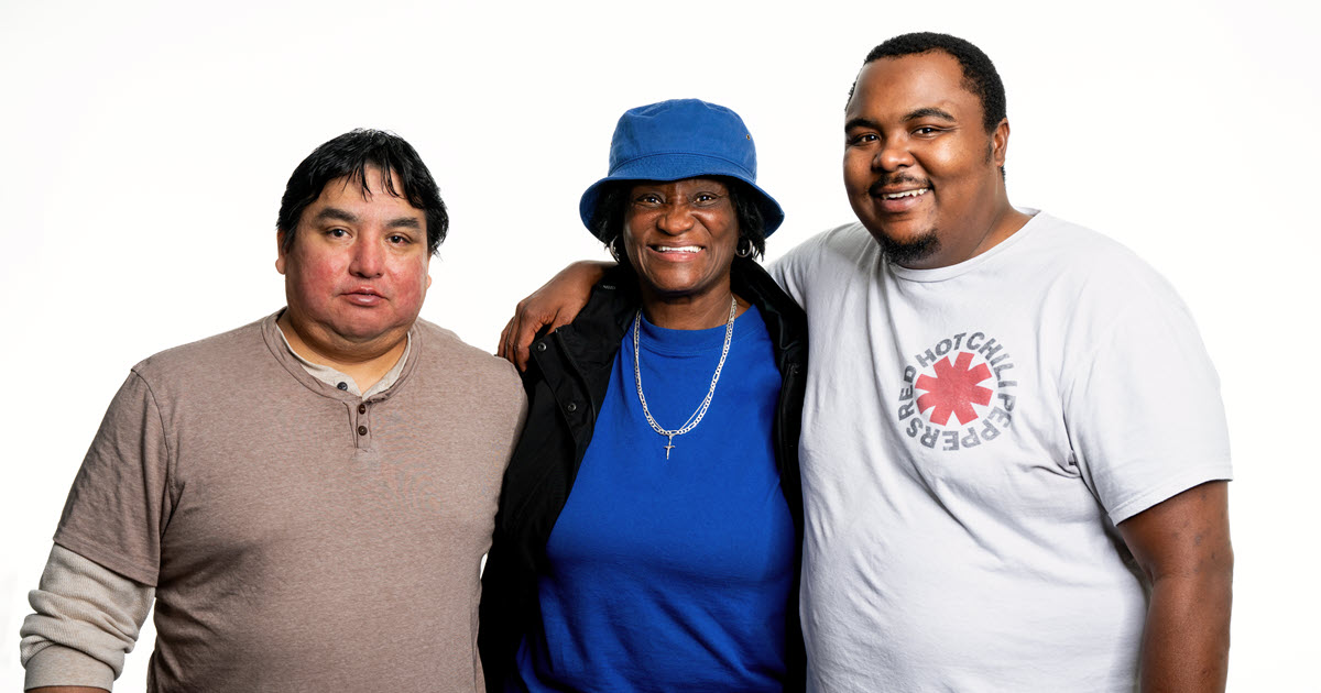 Three DSPs with arms around each other smiling for DSP week