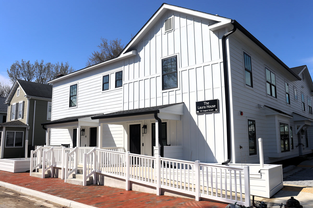 White 7-unit residence named The Laura House in Historic Easton, MD