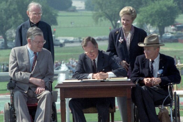 On July 26, 1990, President George H.W. Bush signed the Americans with Disabilities Act (ADA) into law, marking a historic victory for people with disabilities.