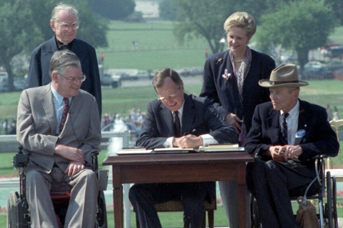 On July 26, 1990, President George H.W. Bush signed the Americans with Disabilities Act (ADA) into law, marking a historic victory for people with disabilities.