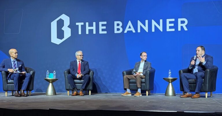 Jonathon Rondeau, President & CEO of Fello on stage with three other people.